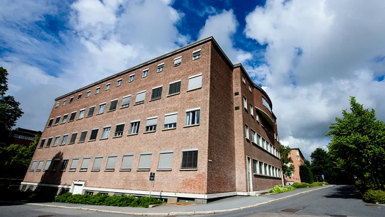 Brick building with blue sky above